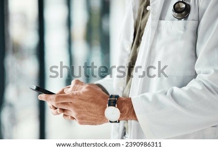 Phone, hands and man doctor typing message, social media or planning online schedule in a hospital. Telehealth, search and male healthcare expert with smartphone for advice, chat or research check