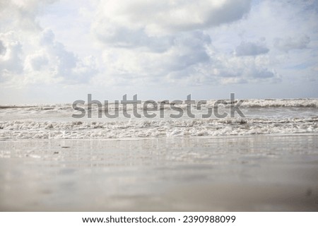 Sandy beach, sea, waves, wind