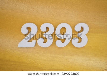 The golden yellow painted wood panel for the background, number 2393, is made from white painted wood.