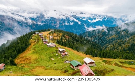 Pokut Plateau view from the air and foggy mountain view from behind. Rize, Turkey. Royalty-Free Stock Photo #2391003499