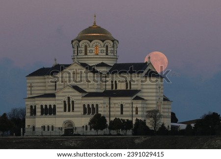The city of Sevastopol (Crimea, Crimean peninsula) Full moon and Vladimir Cathedral in the Tauride Chersonese reserve.