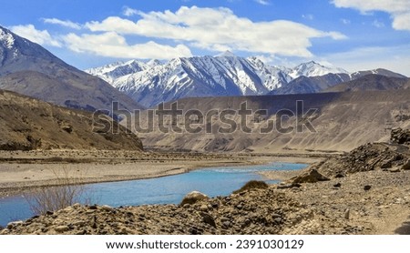 Landscape of Indus river,Turquoise water, with himalaya mountain range in Background, near Pangong Tso ,or  Pangong lake in Ladakh, India.