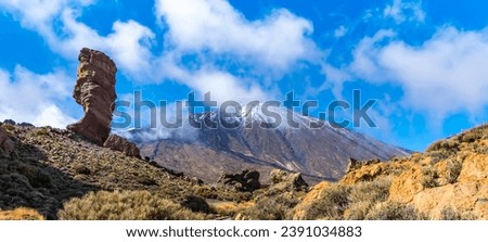 Amazing view of unique Roque Cinchado rock formation with famous Pico del Teide in the background on a sunny day, Teide National Park, Tenerife, Canary Islands, Spain. Artistic picture. Beauty world.