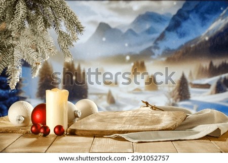 Board of free space for your decoration. Composition of lamp with candle and light. Snow flakes and frost decoration. Christmas tree and balls decoration. December cold day and christmas time. 
