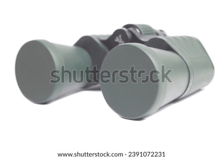 Green military binoculars isolated on white background