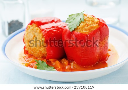 pepper stuffed with meat and rice on a light blue background. tinting. selective focus