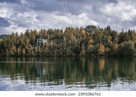Cafe Belvedere upper terrace, Villa Bled Resort. It is former summer tea house of Marshal Tito, President of former Yugoslavia, located on shores of lake Bled. Royalty-Free Stock Photo #2391086761