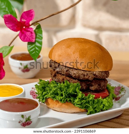 Home made hamburger with lettuce and cheese