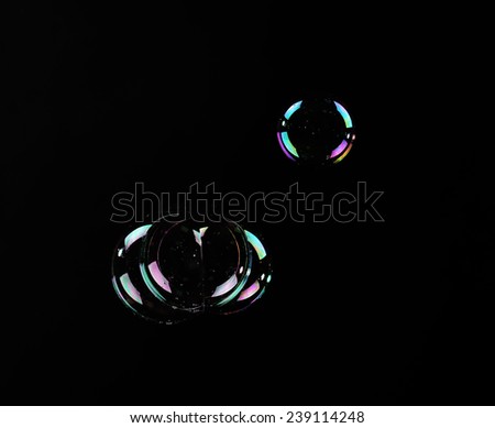 Soap bubbles, on black background