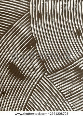 Ceramic back texture forming  imperfect semi circle overlapping lines.  Royalty-Free Stock Photo #2391208703