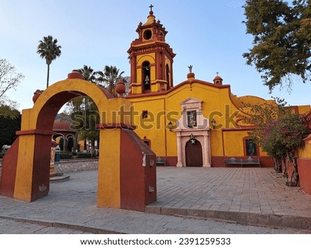 Church in the center of the magical town Bernal where the third largest monolith in the world is located. It belongs to the municipality of Ezequiel Montes in the state of Queretaro, Mexico Royalty-Free Stock Photo #2391259533