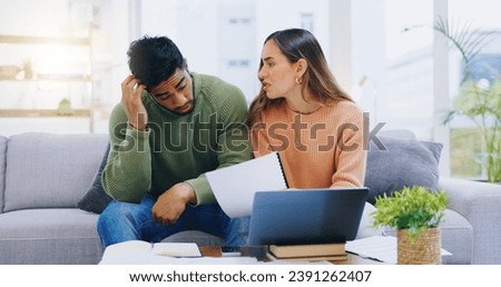 Couple, debt and stress at laptop in home for poor savings, bills and budget of mortgage crisis, taxes or rent. Frustrated man, woman and banking documents for bankruptcy, financial risk or inflation Royalty-Free Stock Photo #2391262407