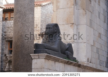 Beautiful View Of Old Split Town With Historical Figure Of Sphinx. Entrance To The Cathedral St. Duje. Peristil Square, Croatia. Royalty-Free Stock Photo #2391305271