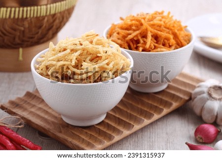 French fries sliced the size of matchsticks, dry fried, usually some are savory and some are spicy Royalty-Free Stock Photo #2391315937