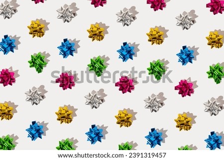 Colorful ribbon bows isolated on white background. Minimal holiday gift concept. Greeting card idea. Copy space.