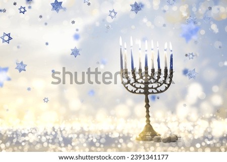 Happy Hanukkah. Candles lit in menorah. Family celebration of Jewish holiday.