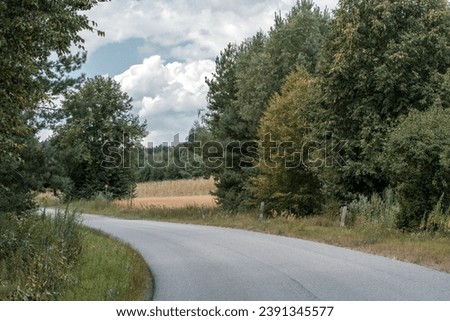 A bend on a rural asphalt road
