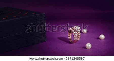 Creative Gold Jewellery Photoshoot with Creative Background and Single Flash Photography Royalty-Free Stock Photo #2391345597