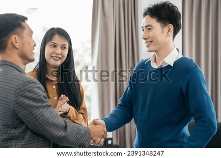 Close up shake hands at office negotiations. Making deal sign, conclude contract, formal greeting, strike bargain. Successful negotiations, insurance home loan concept.
