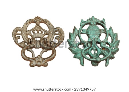 wrought iron knocker isolated on white background with clipping path. Royalty-Free Stock Photo #2391349757