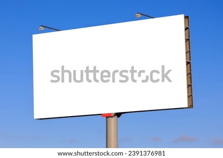 Background for design. Advertising billboard along the road in the city on a autumn sunny day