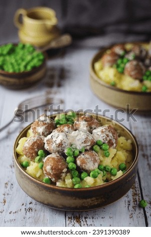 Swedish meatballs with mashed potato side dish - typical dish of Swedish cuisine Royalty-Free Stock Photo #2391390389