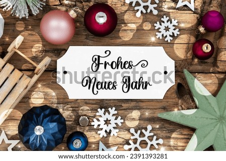 Colorful Christmas Decor With Bokeh, Christmas Balls And Snowflakes, With Sign With German Text Frohes Neues Jahr, Which Means Happy New Year In English