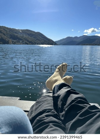 lake view with feet sun water picture