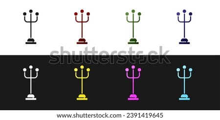 Set Coat stand icon isolated on black and white background.  Vector