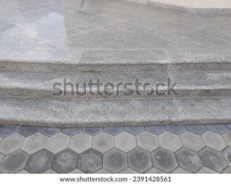Gray marble stairs with walls and floor