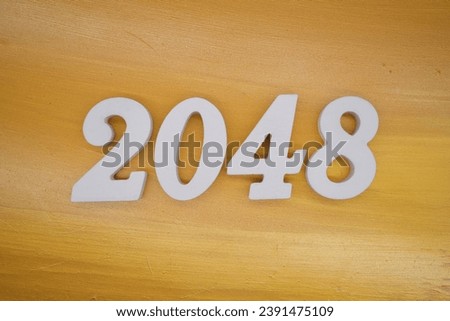 The golden yellow painted wood panel for the background, number 2048, is made from white painted wood.