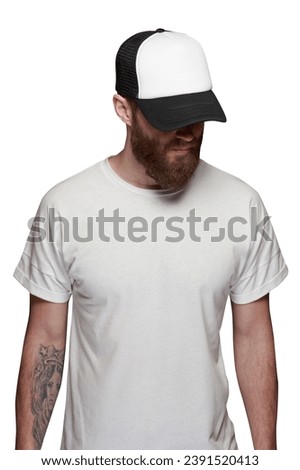 Man with beard wearing white blank t-shirt and a baseball cap isolated