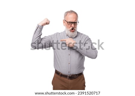 a gray-haired mature man with a beard and mustache in trousers and a shirt is emotionally annoyed