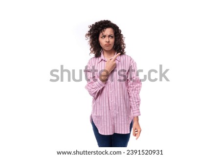 young confident brunette businesswoman dressed in a striped pink shirt isolated on white background