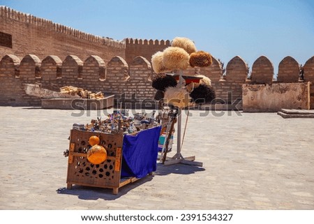 Uzbek traditional clothes such as skullcaps and fur hats and other colorful souvenirs, Tashkent, Uzbekistan.  Royalty-Free Stock Photo #2391534327