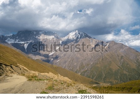 Scenic autumn view of Zagar Pass, a high mountain pass at an elevation of 2.620m, from Ushguli in Upper Svaneti To Sasashi village in Lower Svaneti, Racha-Lechkhumi and Kvemo Svaneti region of Georgia