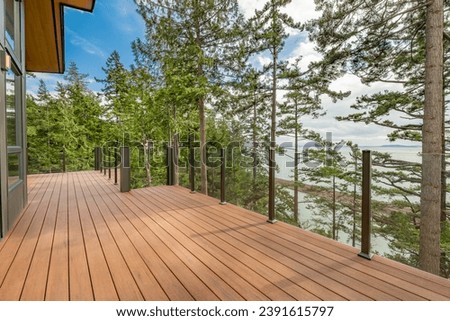Patio deck terrace balcony lanai and sun decks with beautiful blue skies ocean views colorful furnishings patio furniture staging decor and sunshine 