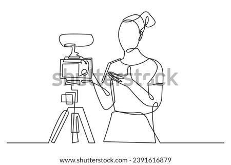 continuous line of content creator.single line vector of woman creating content for social media Royalty-Free Stock Photo #2391616879