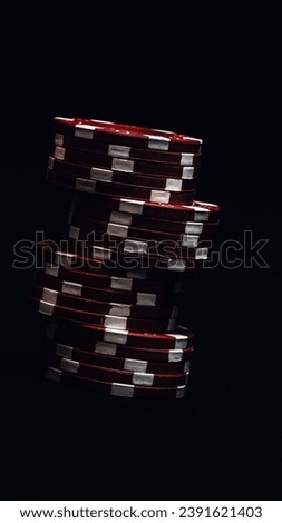 Stack of poker chips for high-stakes casino games Royalty-Free Stock Photo #2391621403