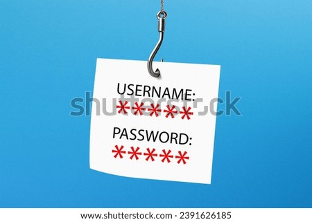Phishing Concept. Cybercrime. Identity information on a notepaper attached to a hook. Royalty-Free Stock Photo #2391626185