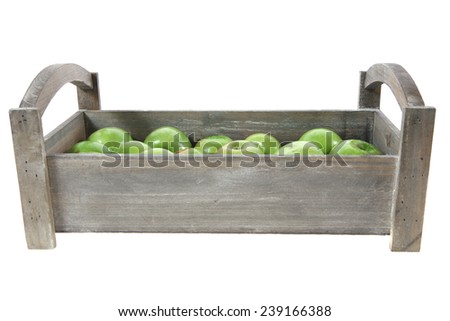 fresh green apples in vintage grey box ready to sell isolated on white background