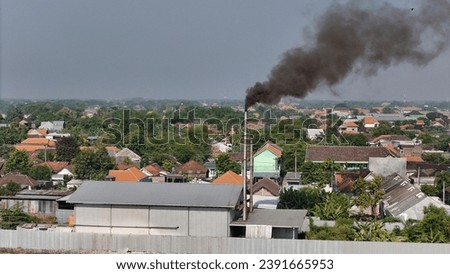 Factories that produce smoke will produce pollutants such as nitrogen oxides, sulfur dioxide and hydrocarbons. Factory smoke is one of the main causes of air pollution. Royalty-Free Stock Photo #2391665953