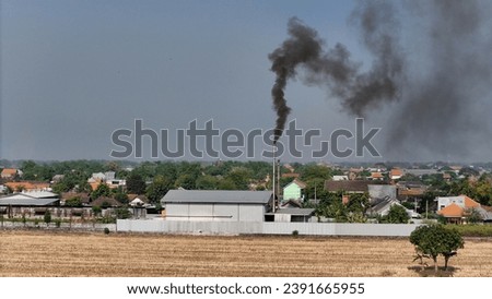 Factories that produce smoke will produce pollutants such as nitrogen oxides, sulfur dioxide and hydrocarbons. Factory smoke is one of the main causes of air pollution. Royalty-Free Stock Photo #2391665955