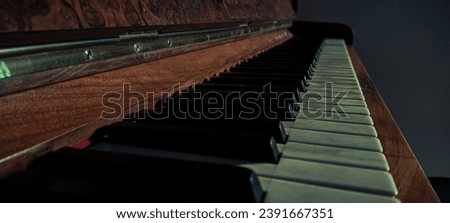 A piano with a dark color grading