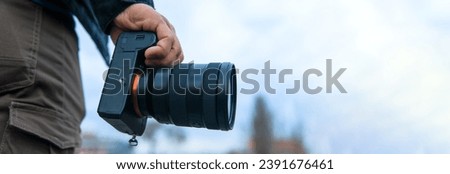 photographer hand camera in street
