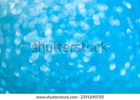 Abstract blurred background. Defocused portrait lens back. Backdrop bokeh. Design blank. Graphic resource for the designer. Vivid blue. Royalty-Free Stock Photo #2391690705