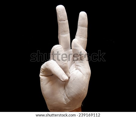 Sign Language American alphabet with hands painted white over black background letter k