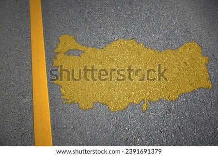 yellow map of turkey country on asphalt road near yellow line. concept