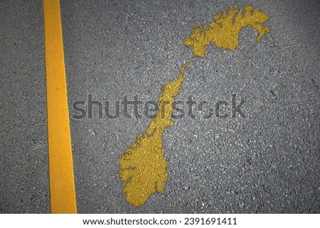 yellow map of norway country on asphalt road near yellow line. concept