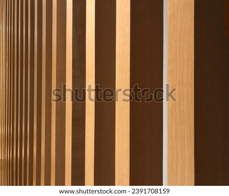 Beautiful abstract pattern of light color wood vertical stripe in angle with edge, wall decorated with wooden planks, Futuristic geomatric wall design, Wood pattern Royalty-Free Stock Photo #2391708159
